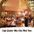 May be an image of 1 person and text that says "Cafe Guitar Mộc Căn Nhà Xưa"