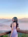 May be an image of 1 person, standing, sky and mountain