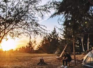 May be an image of 1 person, standing and outdoors