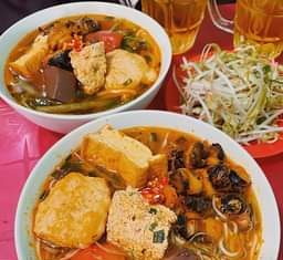 May be an image of chow mein and indoor